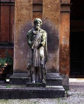 The main entrancedetail of a statue of a prisoner on guard