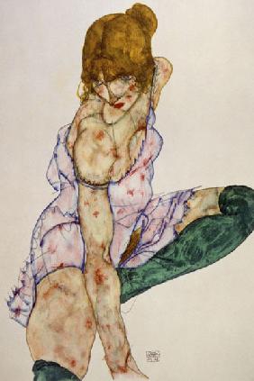Fair-haired girl with green stockings