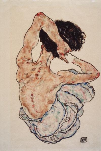 Woman with clasped hands, back view