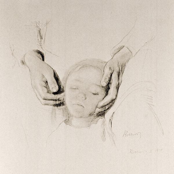 Head of a child in hands