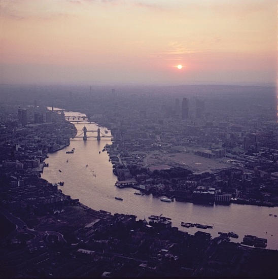 Aerial view of London, looking West along the River Thames from 