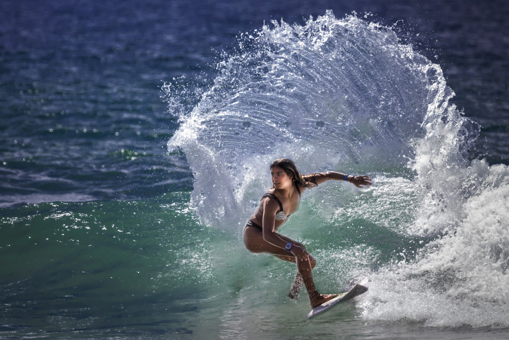 Surfing Girl from Yun Thwaits